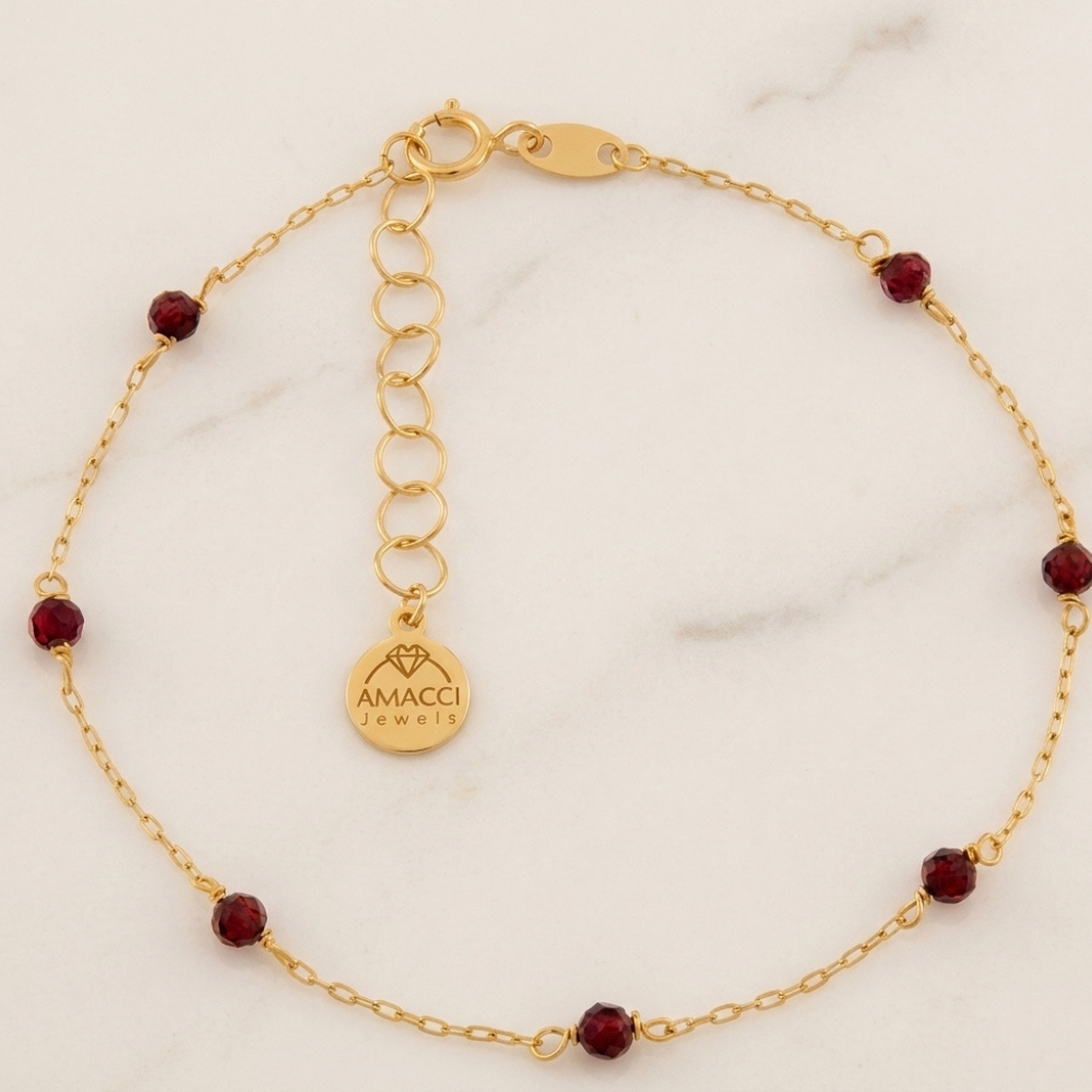 18K gold bracelet with 7 natural garnet stones by Amacci Jewels