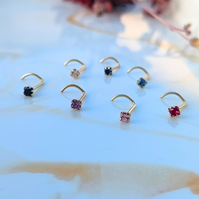 Muestraro piercings de oro 18K
